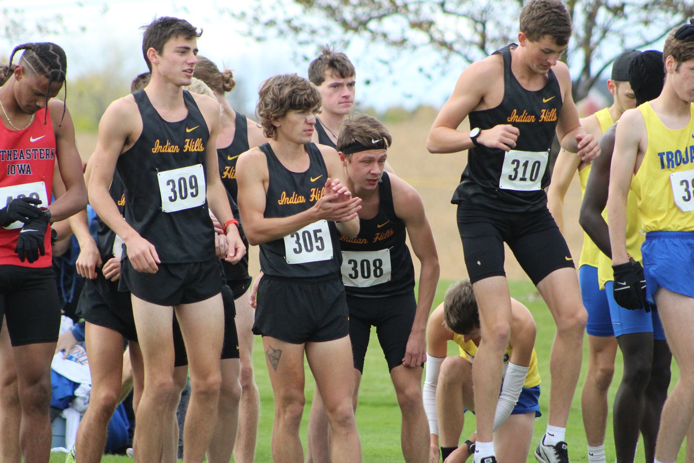 BRYANT LEADS MEN TO THIRD AT REGIONAL FINAL