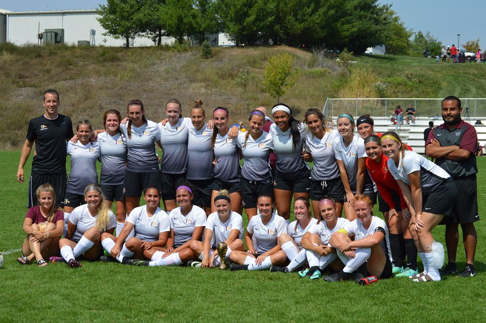 Team photo celebrating winning the Wells Fargo Cup.